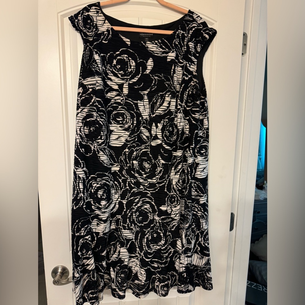 Selling a black and white dress.